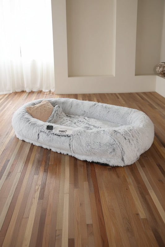Oversized faux-fur orthopedic dog lounger for large breeds