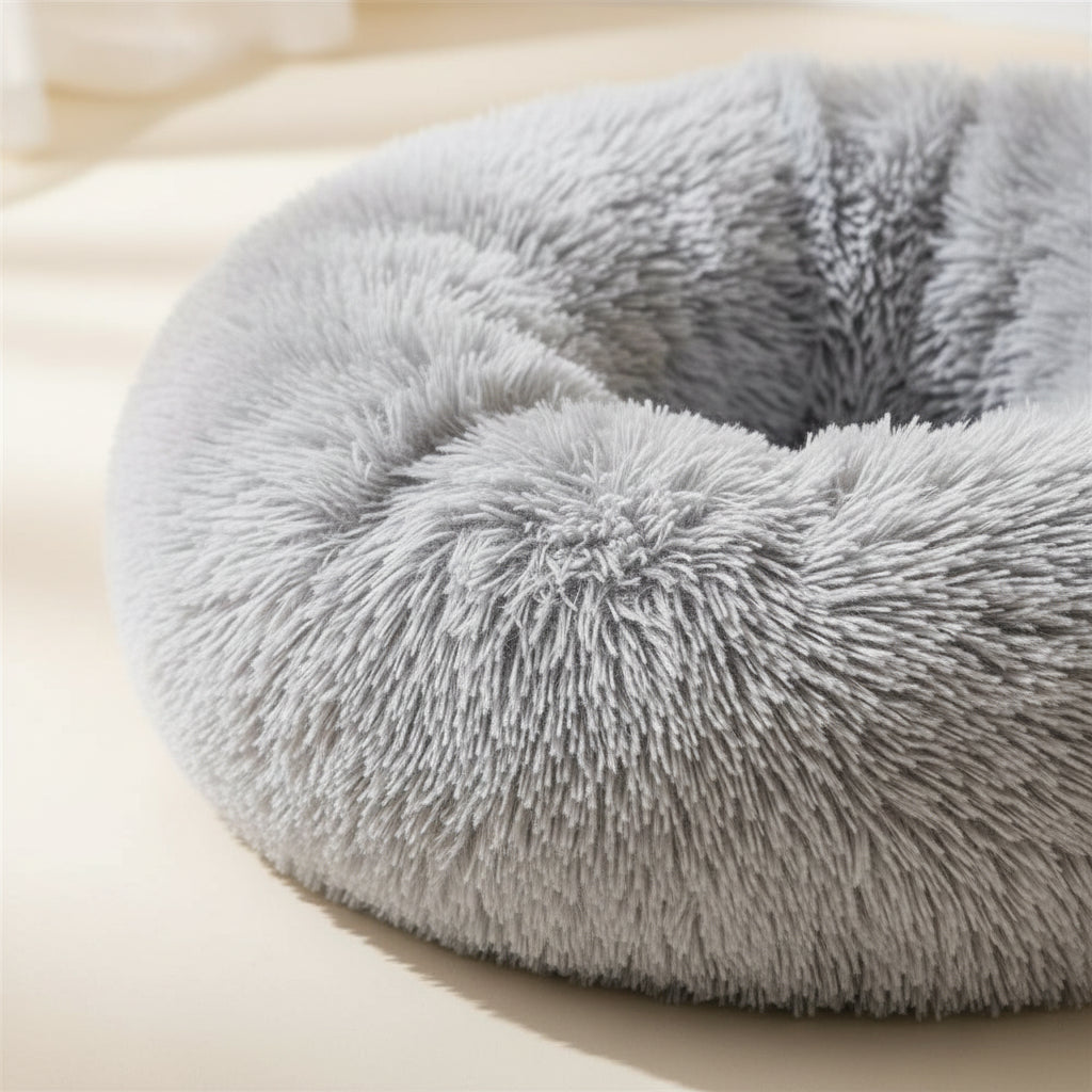 Machine-washable calming pet nest shown in two neutral colors
