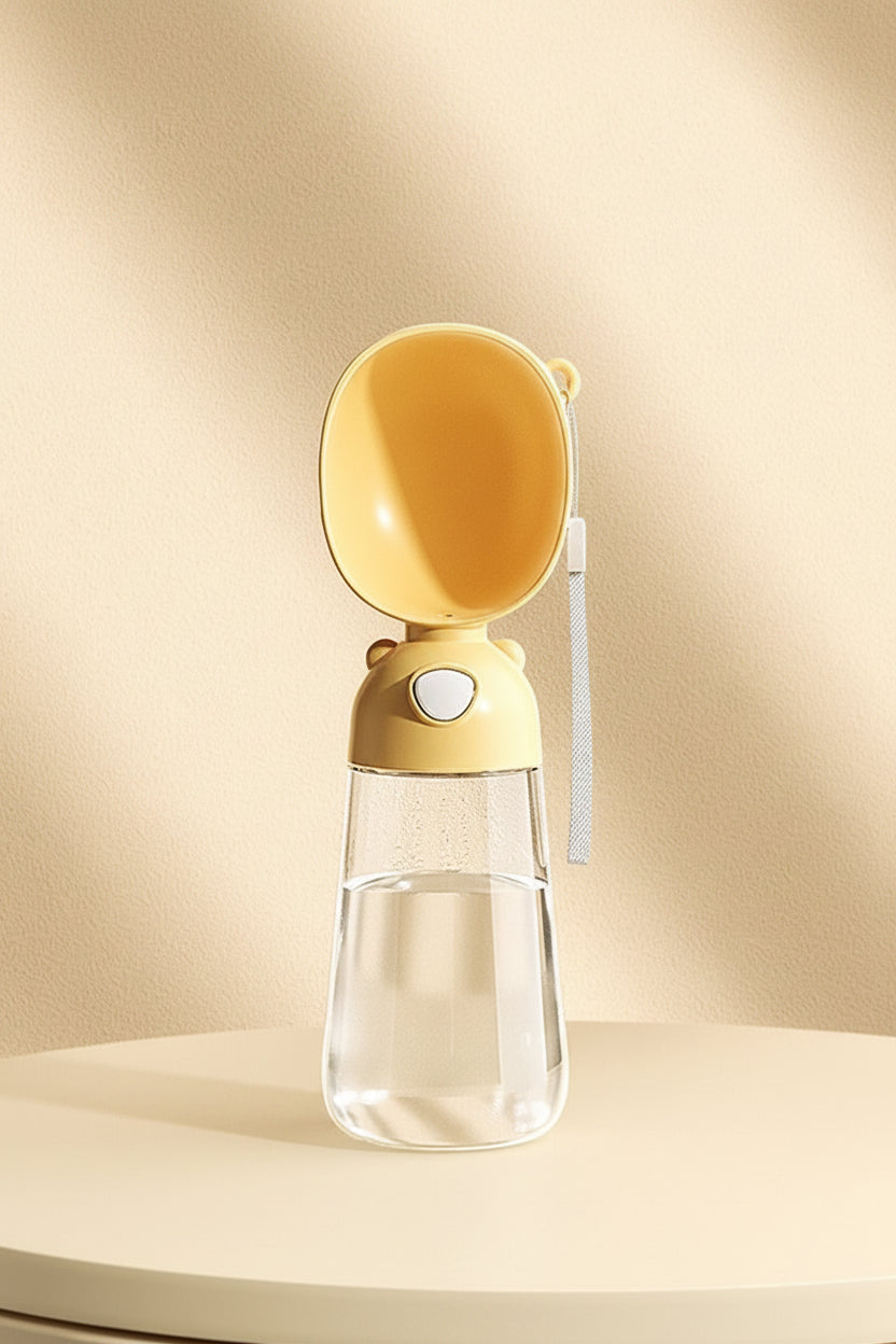 Portable dog water dispenser shown open with built-in bowl
